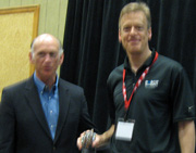 Exacq receiving 'Rising Star' award from PSA